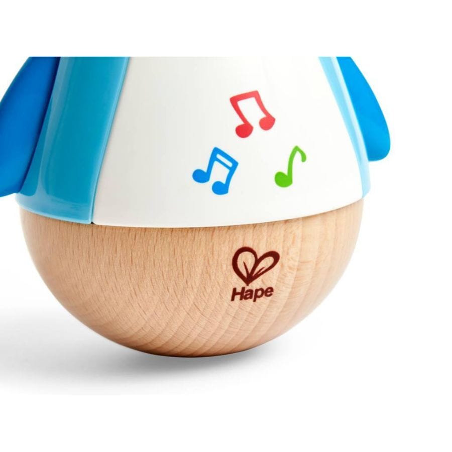 Toynamics Baby-Aktiv-Spielzeug Hape Stehauf-Pinguin mit Musik – ab 6 Monate