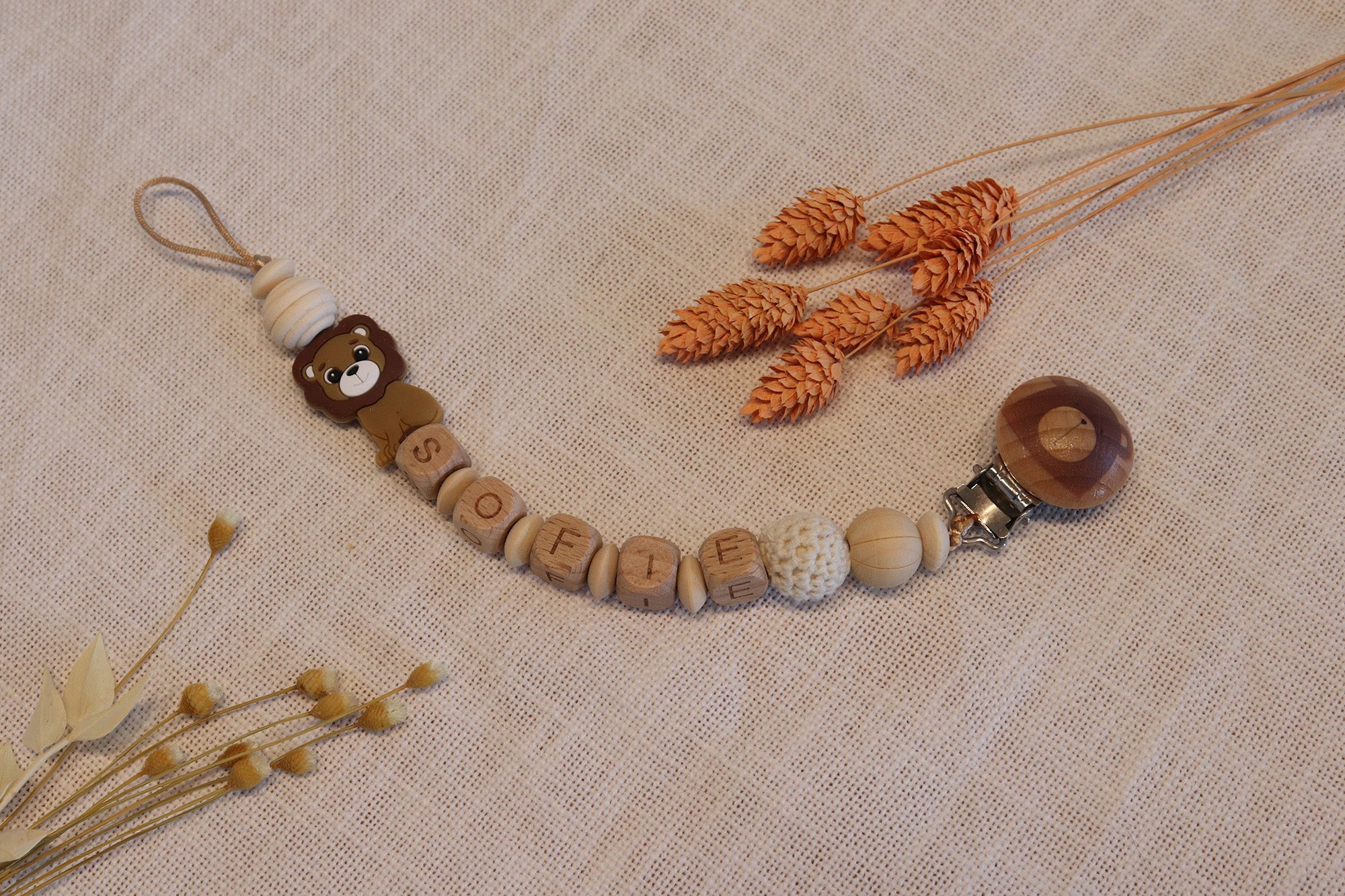 Schnullerkette mit Name mit SIlikon Löwe aus Holzperlen