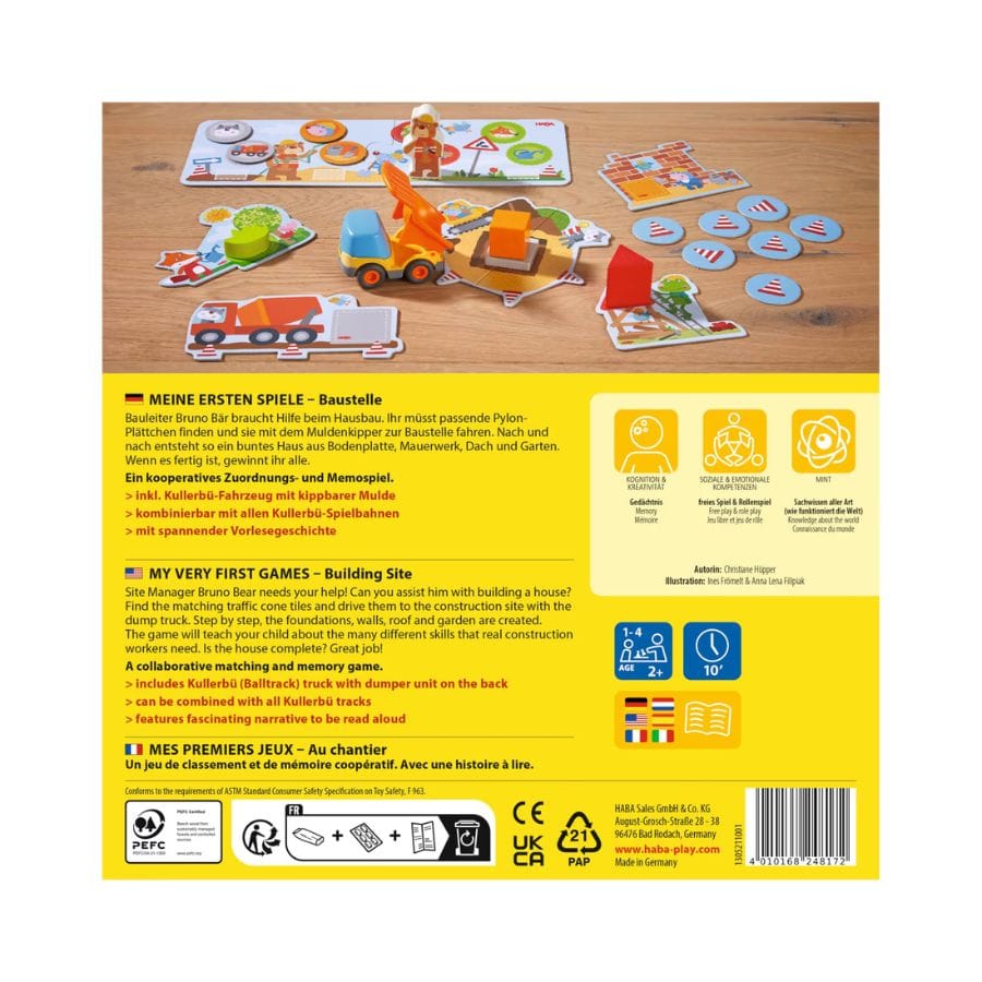 HABA Baustelle Spielinhalt auf Holztisch – Pylon-Plättchen, Muldenkipper und Spielplan des Zuordnungsspiels